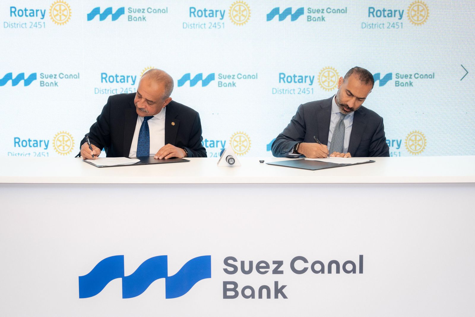 بنك قناة السويس يوقع برتوكول تعاون مع الاتحاد النوعي لأندية روتاري مصر