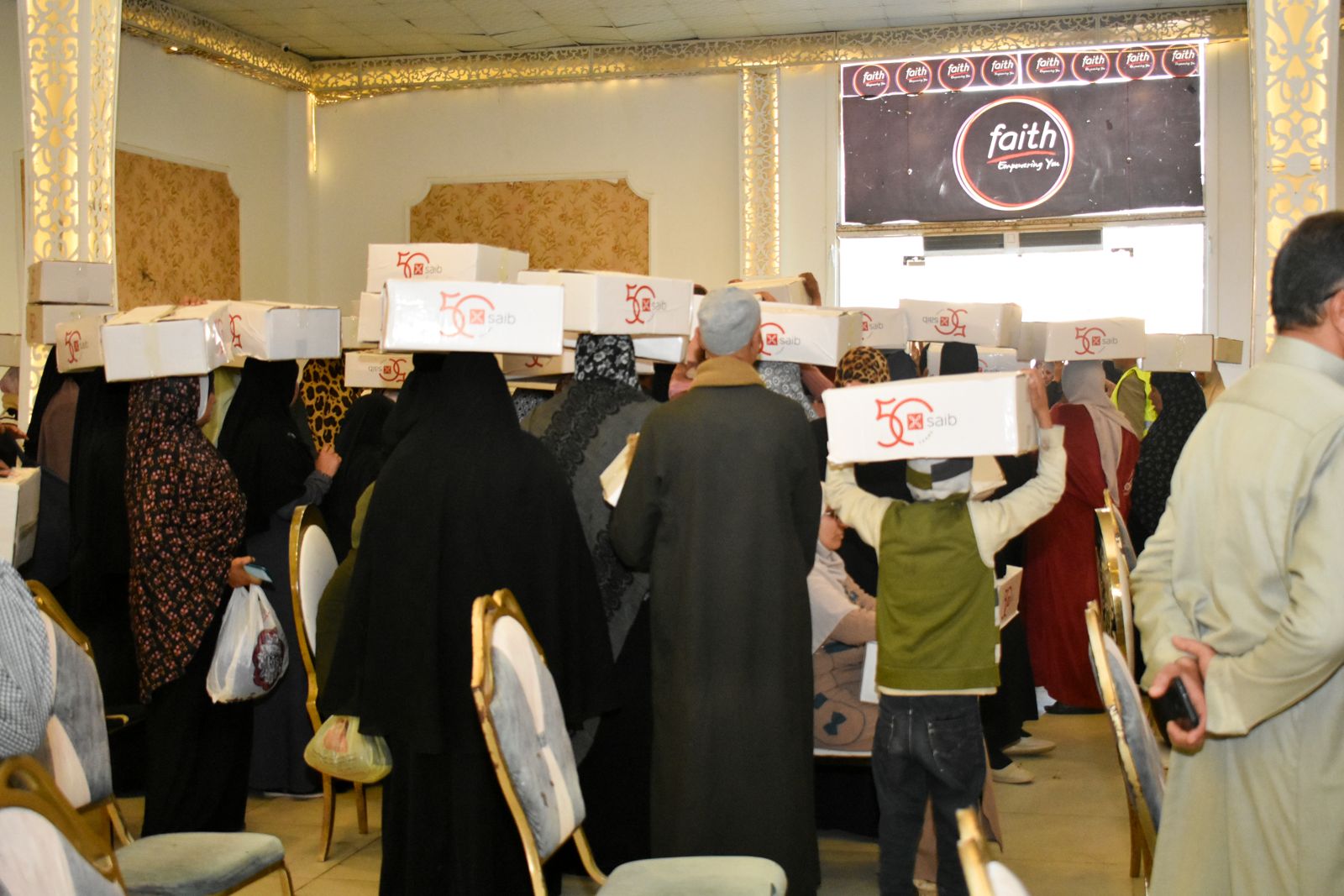 بنك saib يوزع كراتين رمضان بالتعاون مع جمعية الأورمان